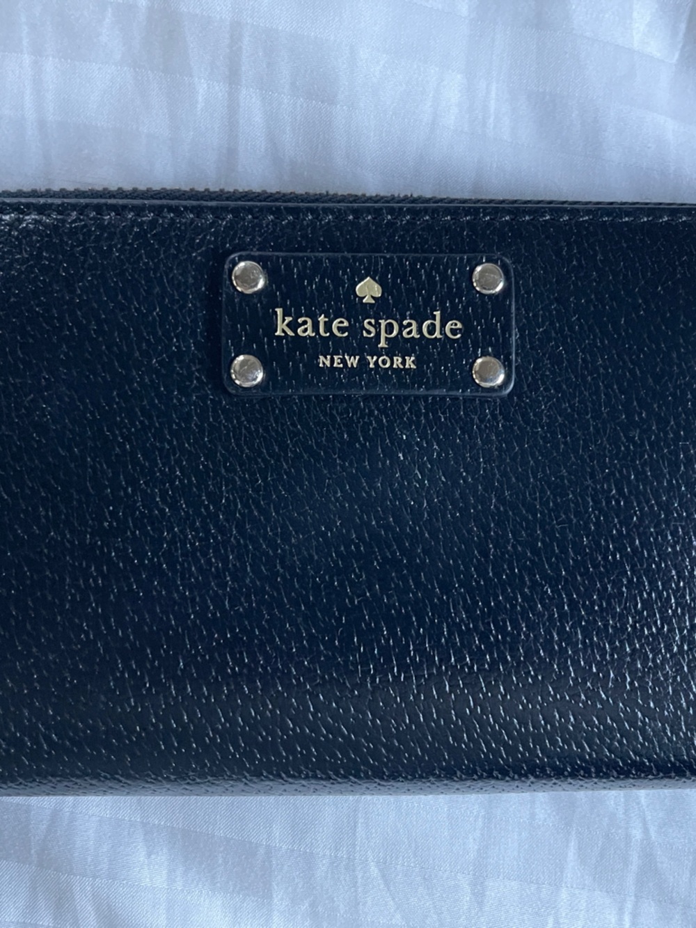 kate spade Black Pebbled Leather Zip Wallet with Gold Plaque